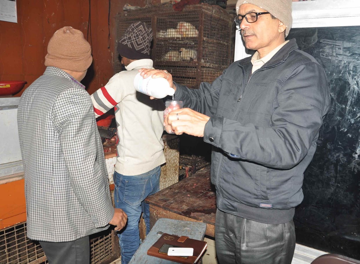 Four shopkeepers arrested in open meat bench