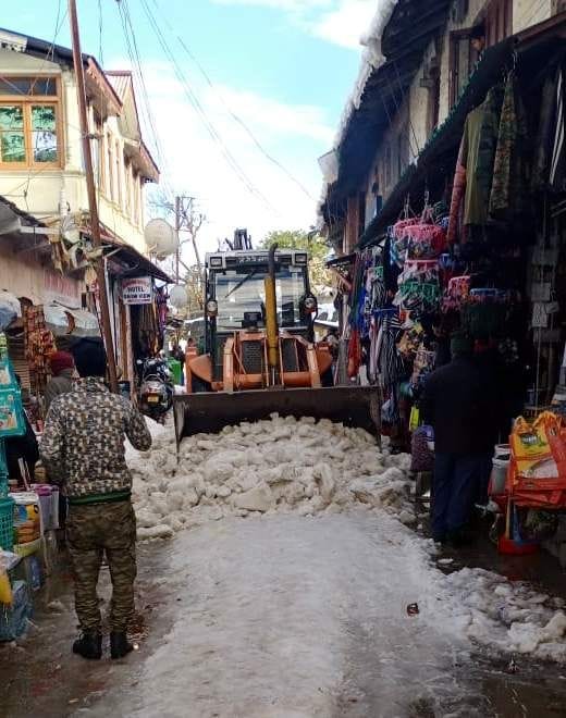 Four days later, the snow was off the roads, traffic restored