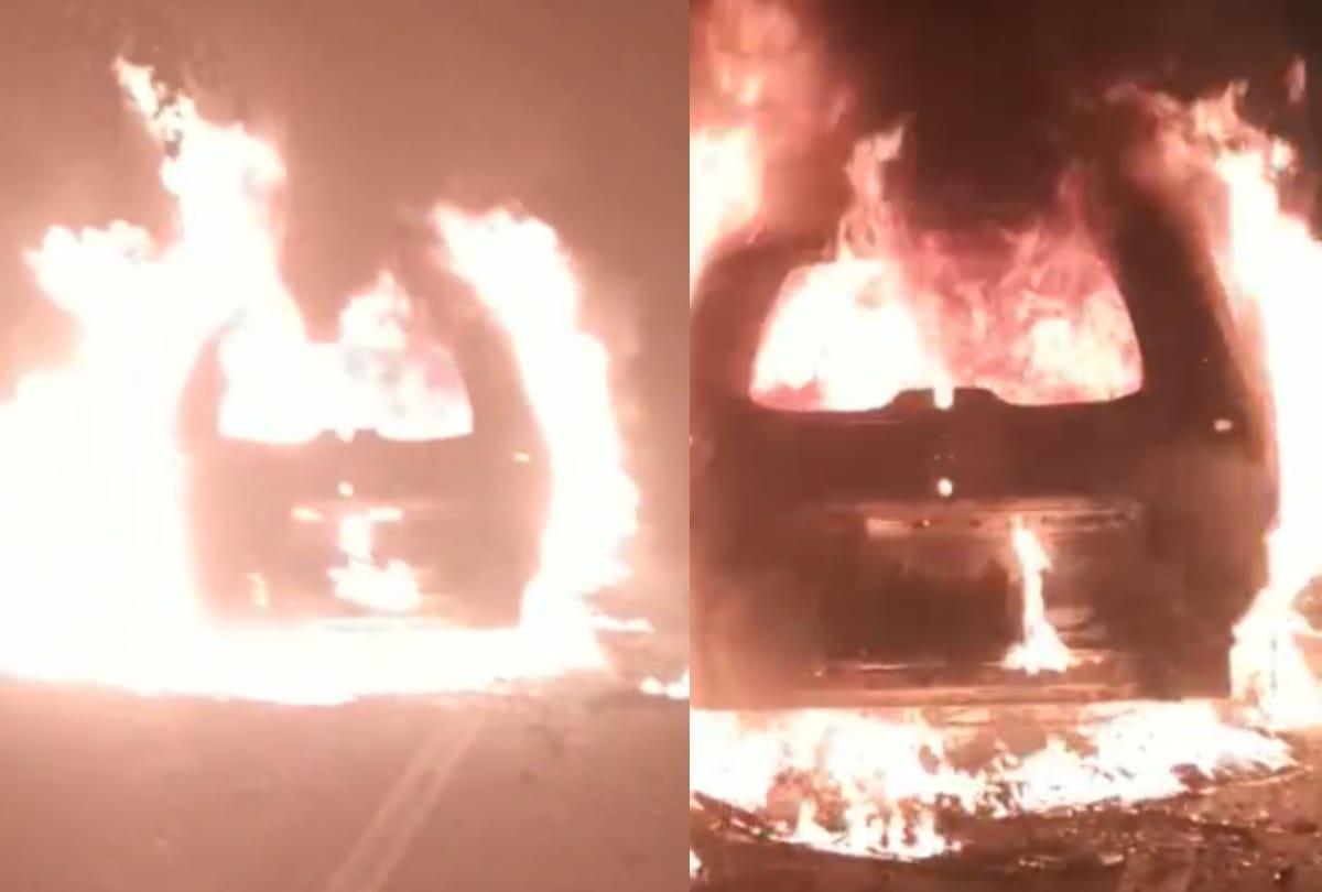 burning car on the road in basti