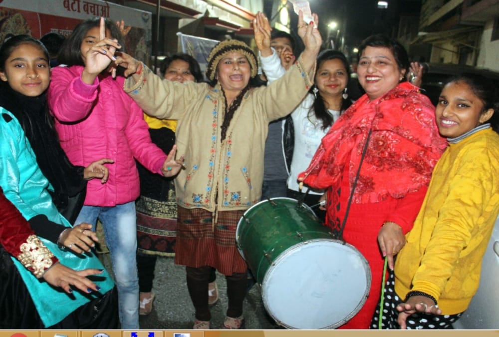 Lohri 2020 Celebration in uttarakhand during rainfall photos