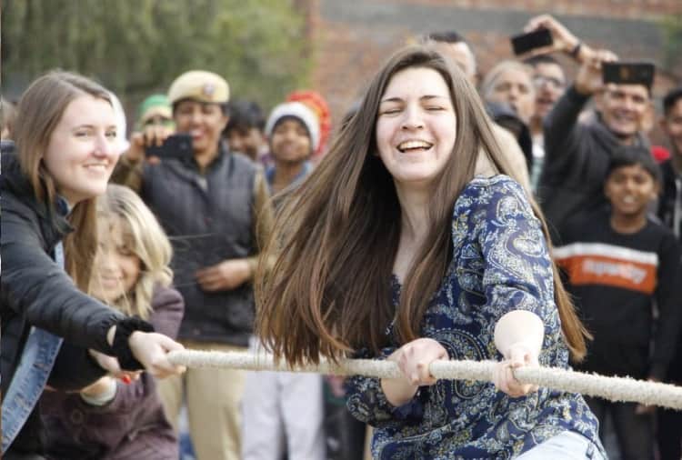 American girl students play many games with women and girls of Haryana's village