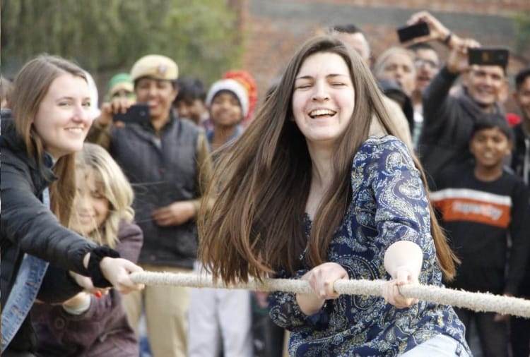 American girl students play many games with women and girls of Haryana's village