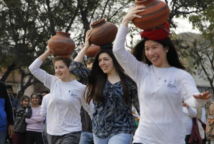 American girl students play many games with women and girls of Haryana's village