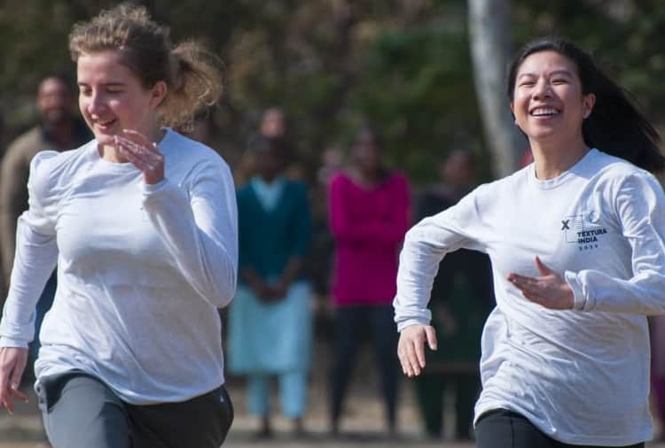 American girl students play many games with women and girls of Haryana's village