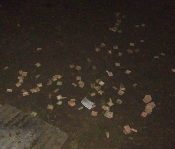 Opening bolts of tin shed and blowing cash from the shop