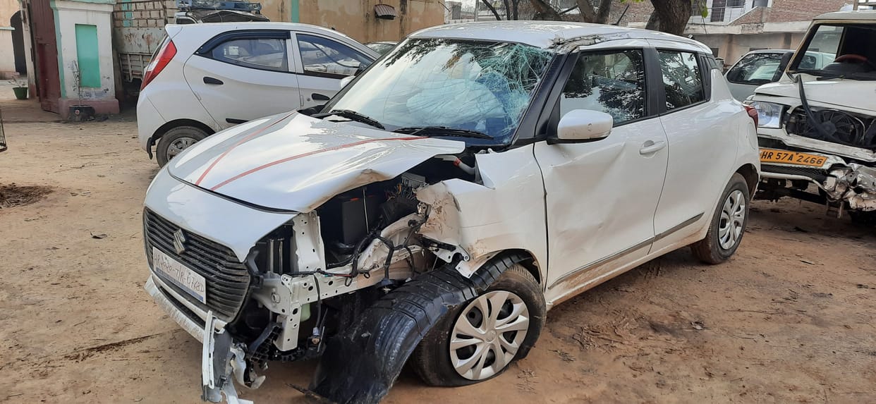 New car of family going to out of station colides with truck