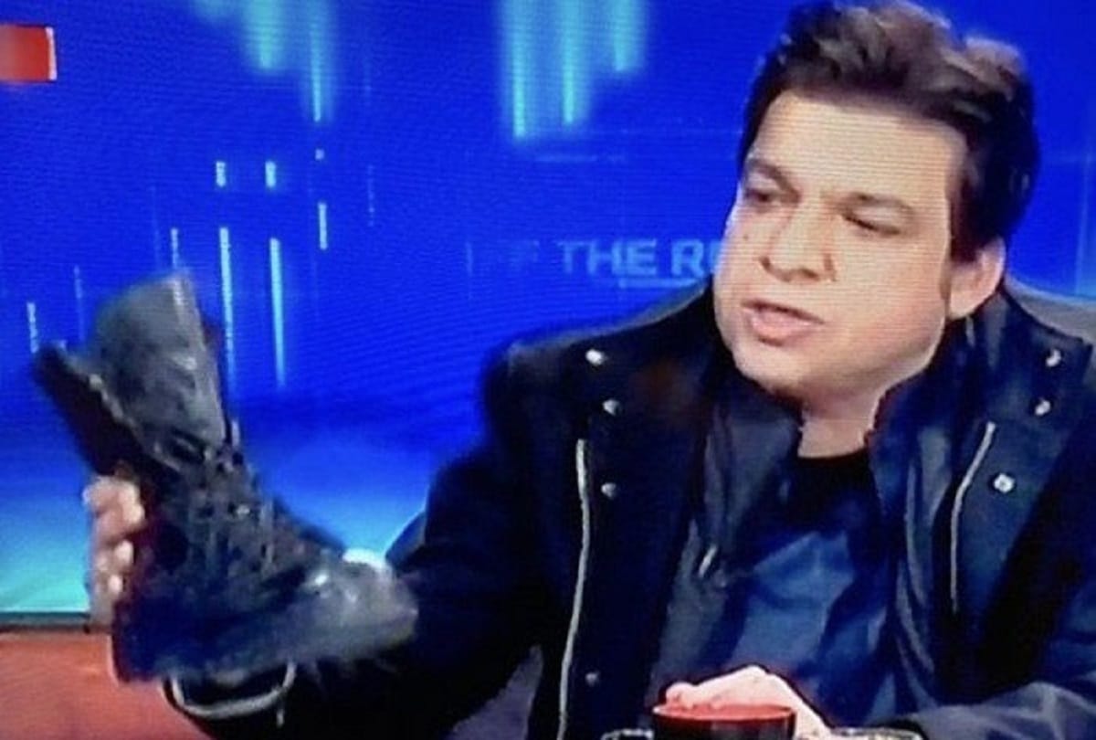 Pak minister come with army boot in TV show, Pak media watchdog bans TV anchor, show