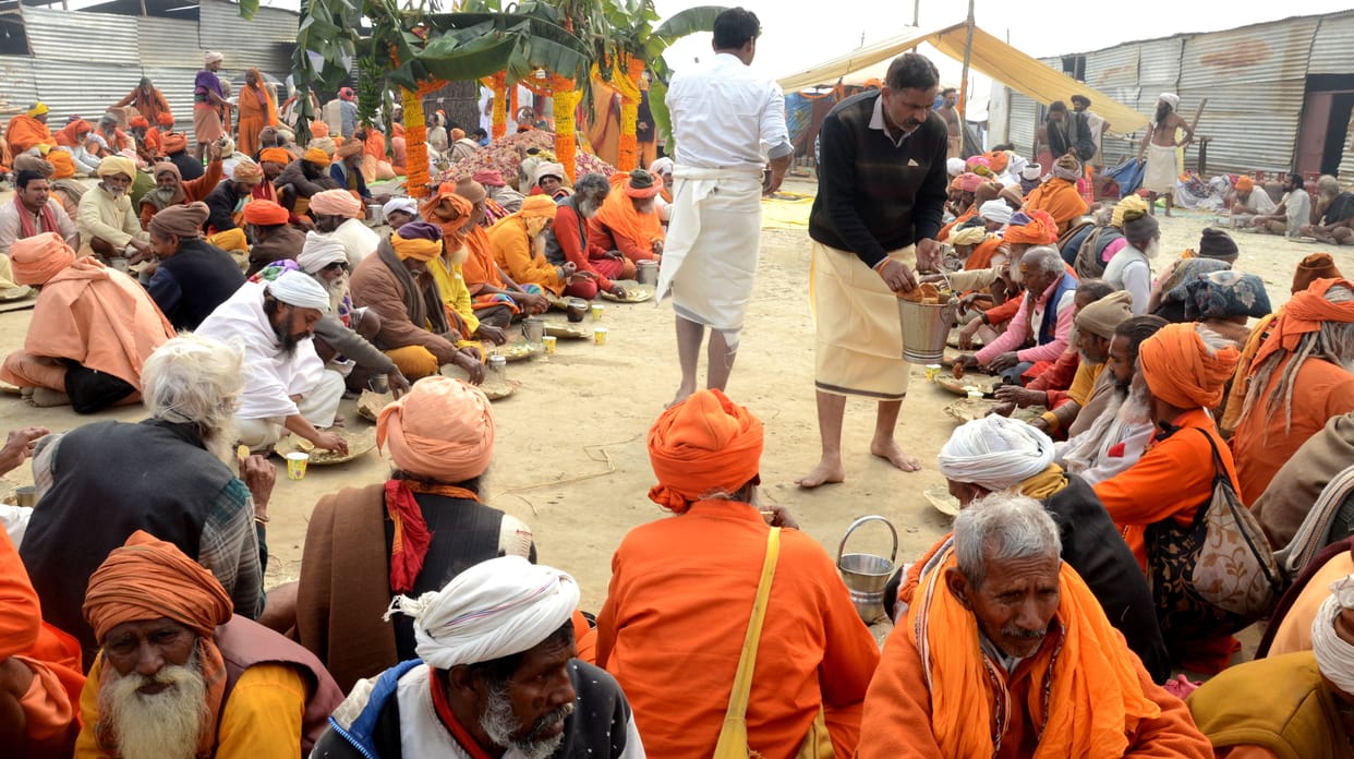 Sage-devotees' camp Gulzar resonating with satsang-bhajans in Magh Mela