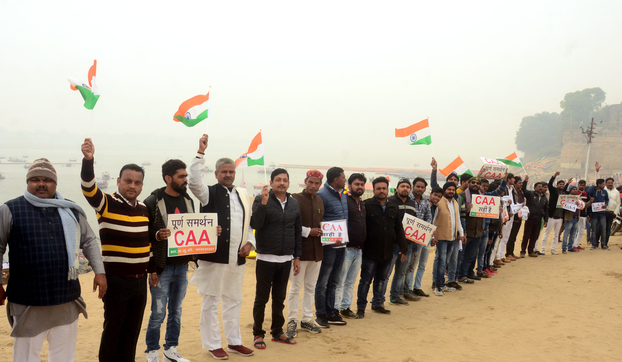 The human chain formed in support of the Sangam with the tricolor and the CAA