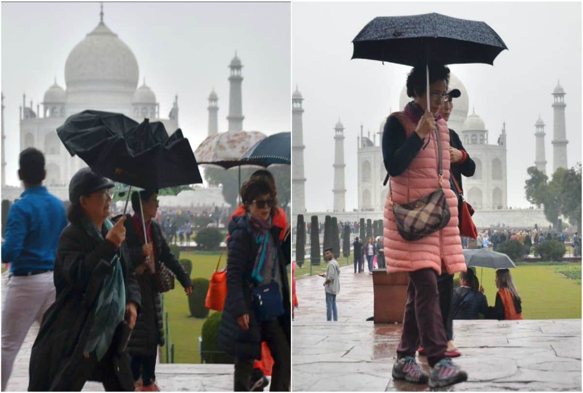tourists viewed the Taj Mahal during drizzling rain agra weather