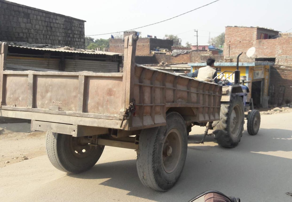 Tractor trolleys running without number plate in the city