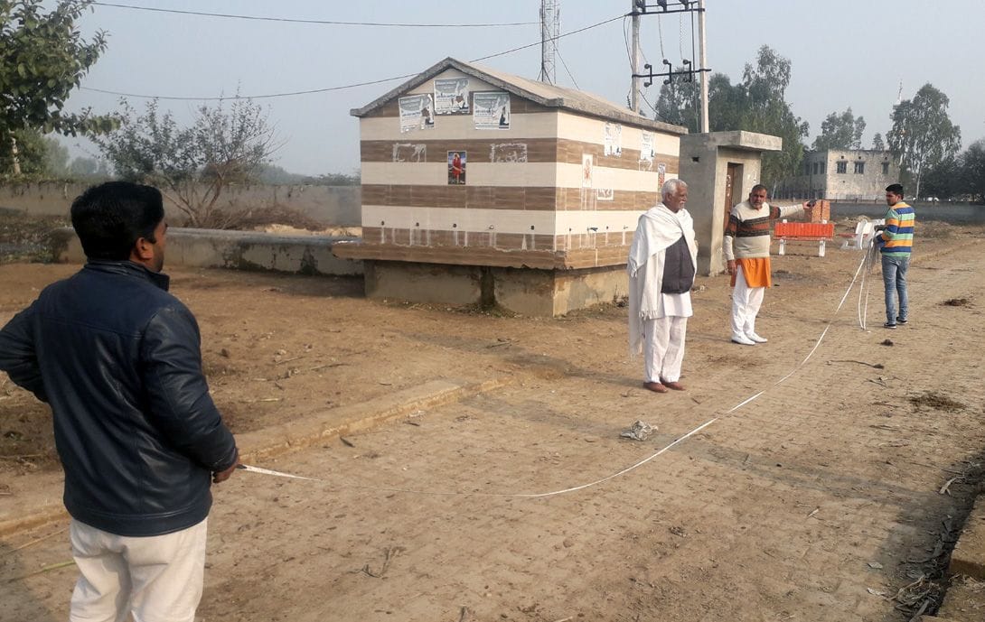 officers ingaged in making a estimate for the development of the village