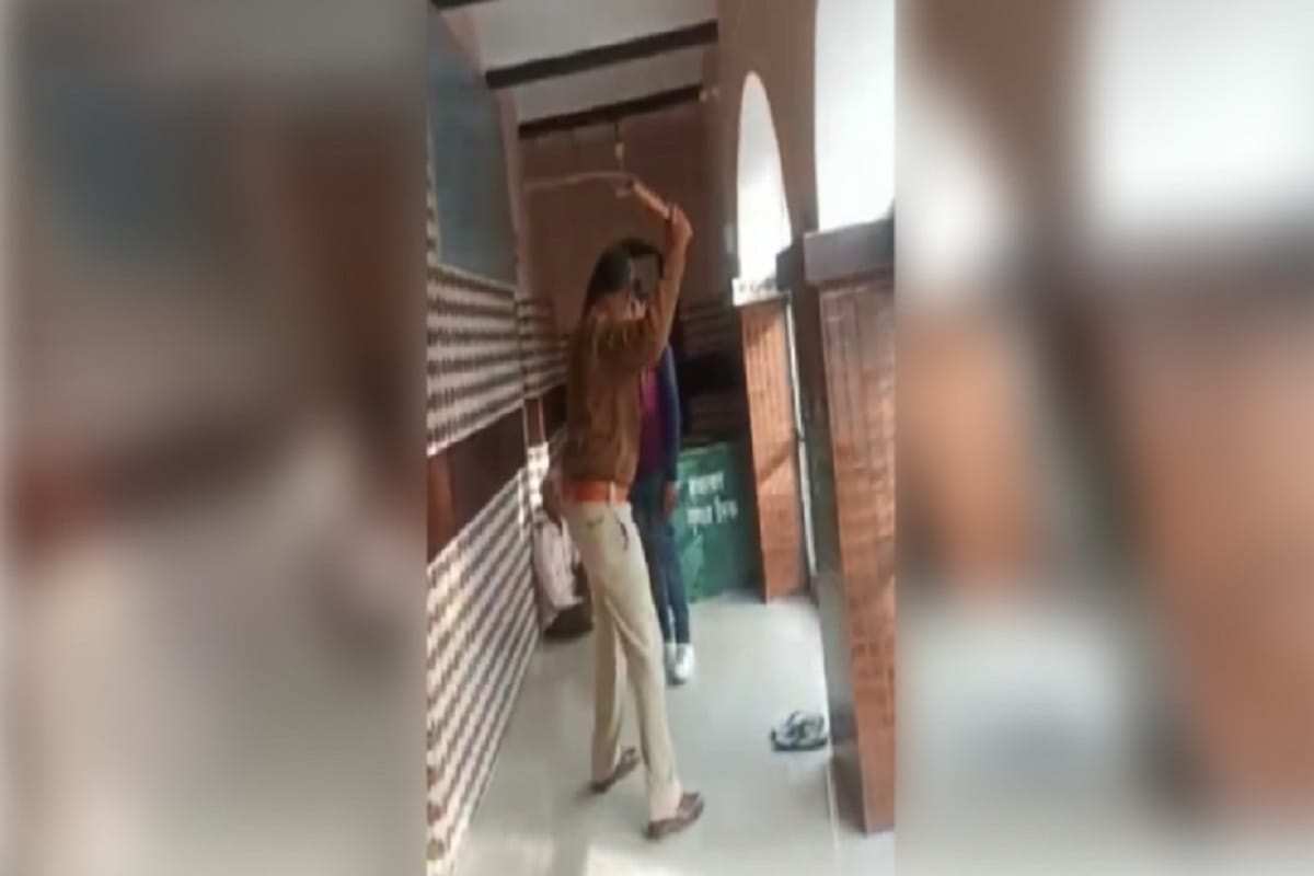 Inspector beaten up a youth in police station at Bijnor district of Uttar Pradesh
