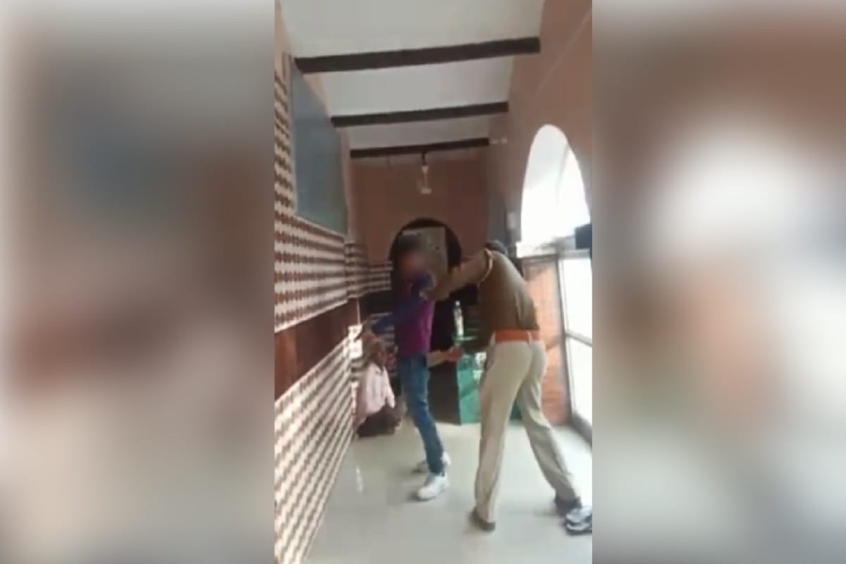 Inspector beaten up a youth in police station at Bijnor district of Uttar Pradesh