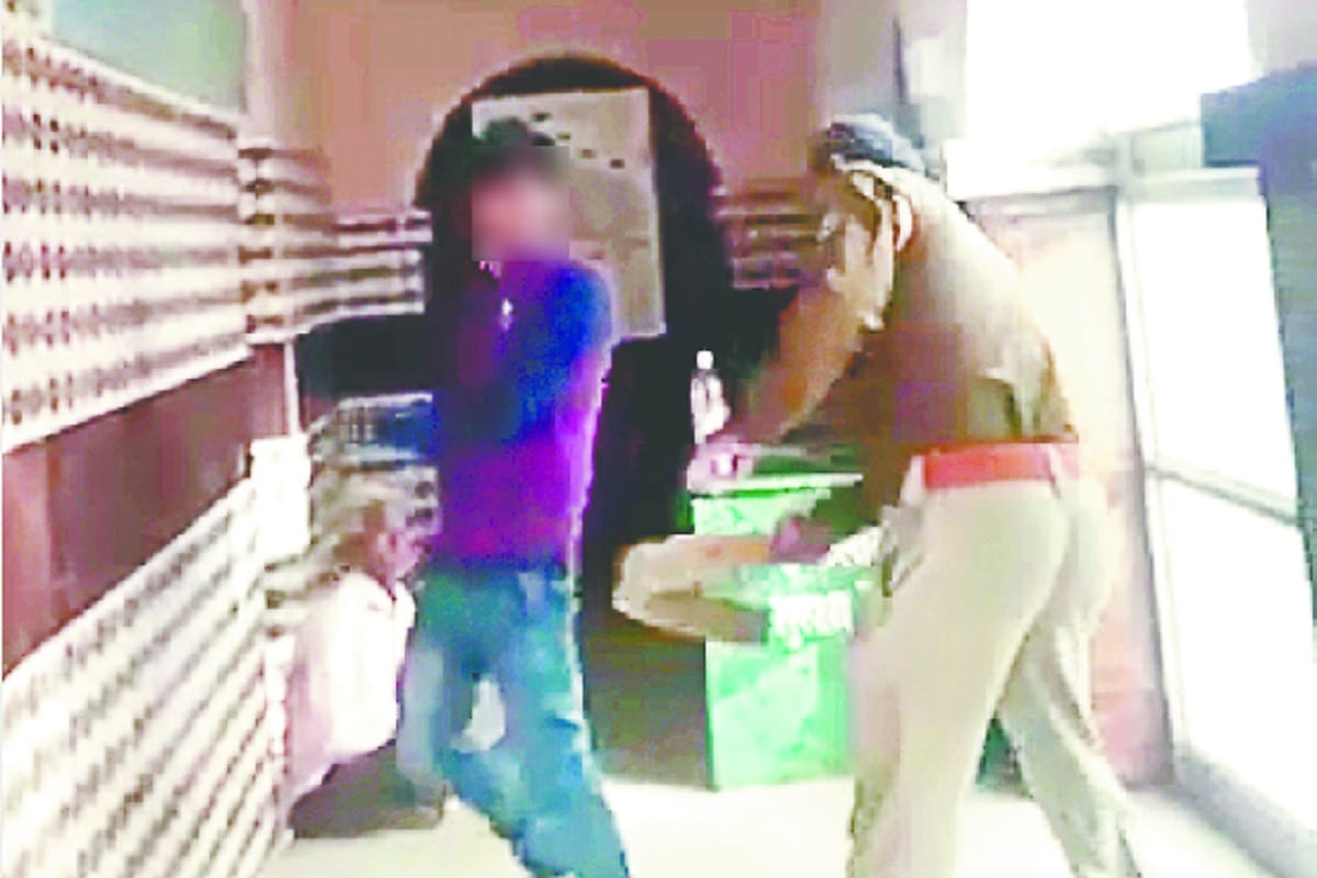 Inspector beaten up a youth in police station at Bijnor district of Uttar Pradesh
