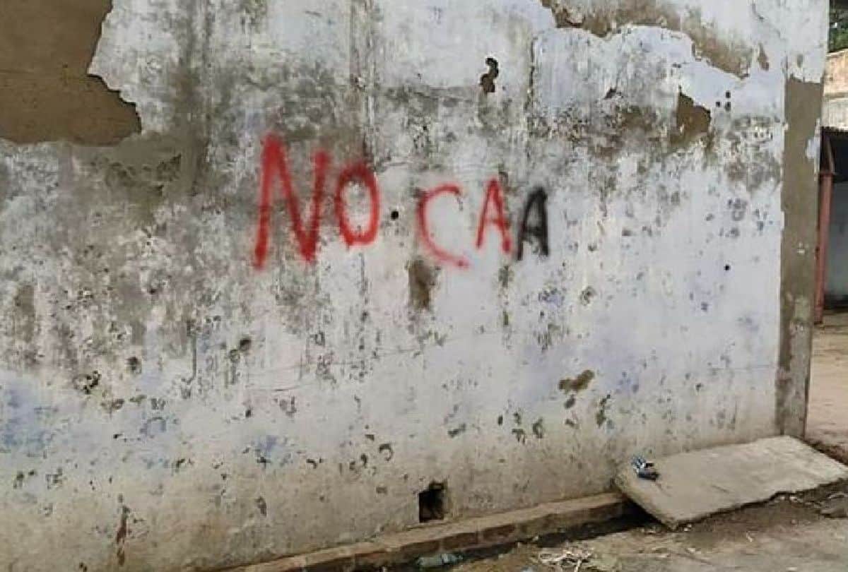 anti caa nrc slogans on walls before bjp rally in agra