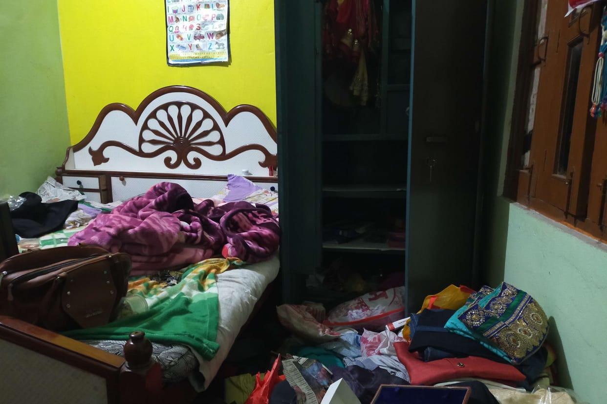 Robbery by breaking the lock of a policeman's house