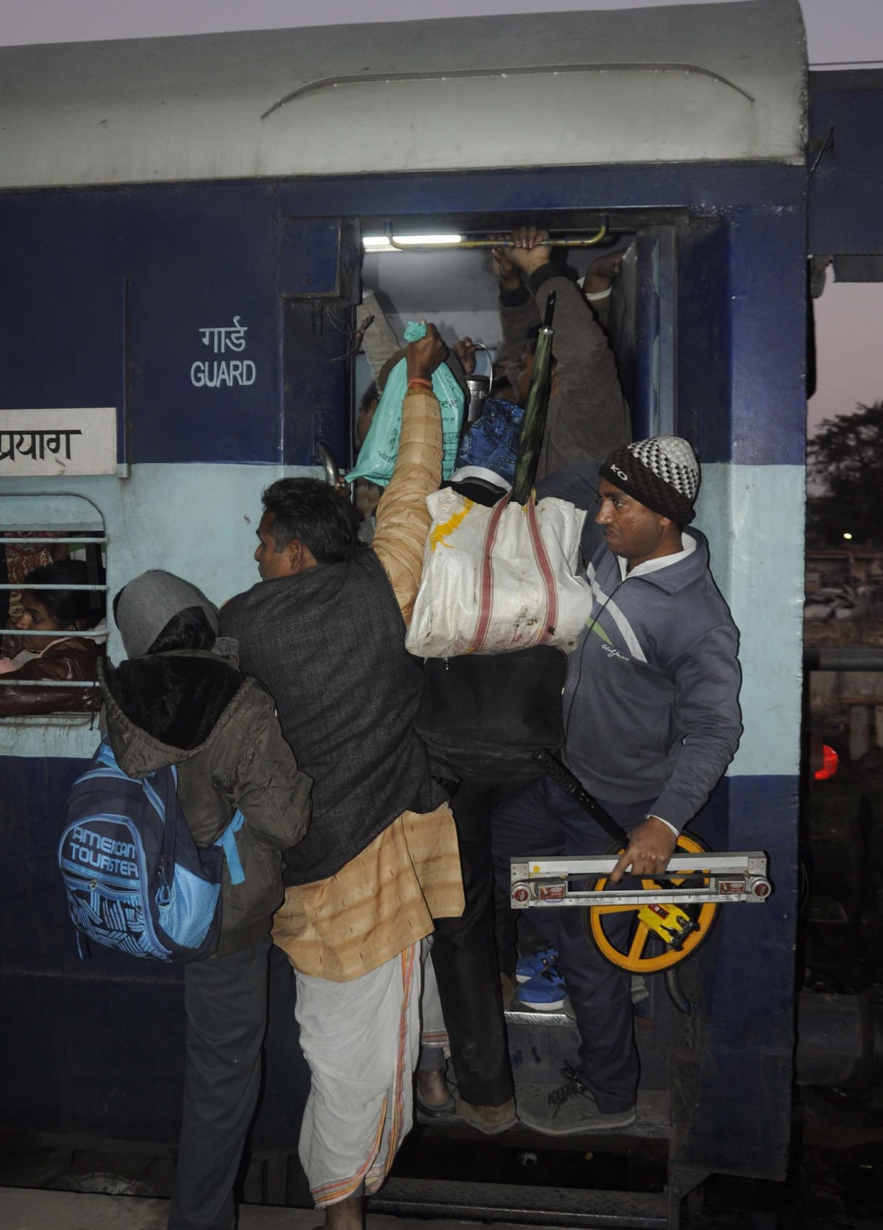 Devotees pour in to dip Mouni