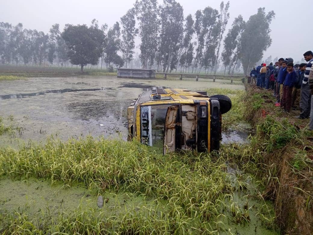 School bus overturned in pond at kashipur