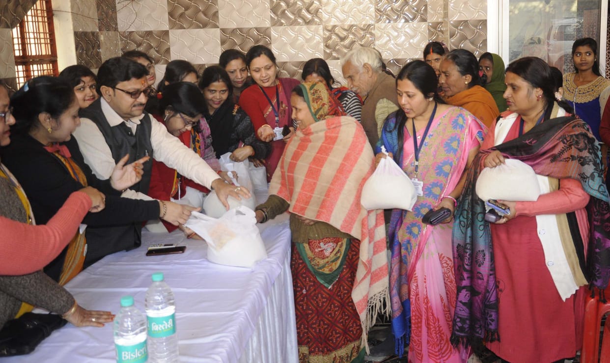Food material distributed to 115 poor under handful of food grains campaign