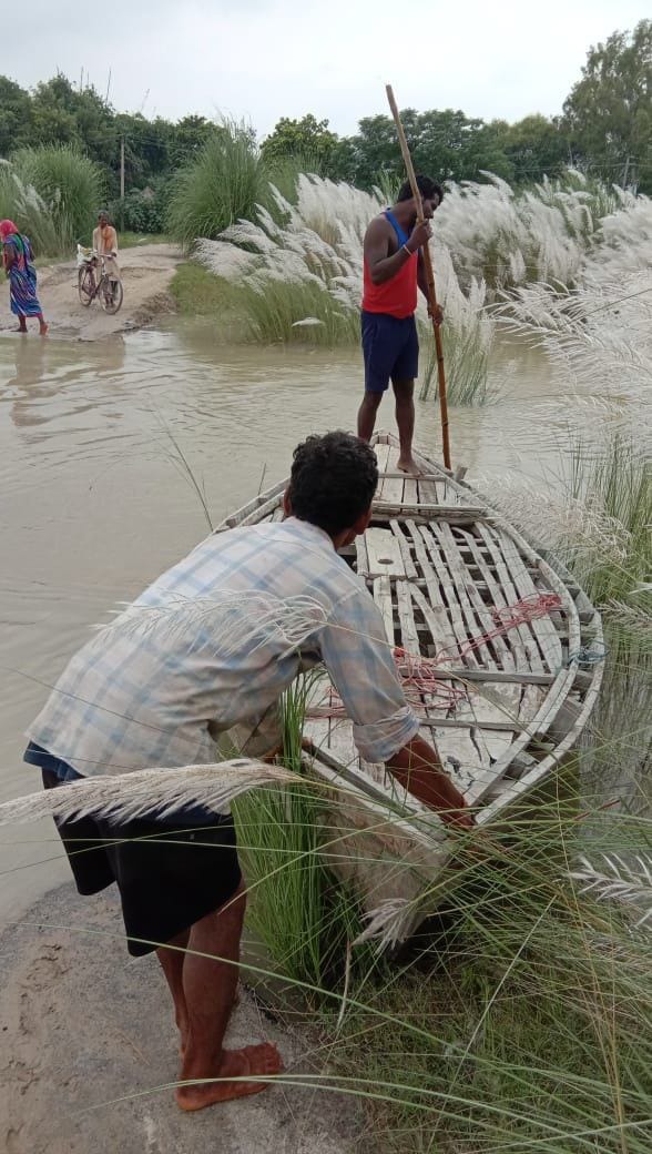 A village where traffic from the footpath still being used, a boat is built in the rainy season