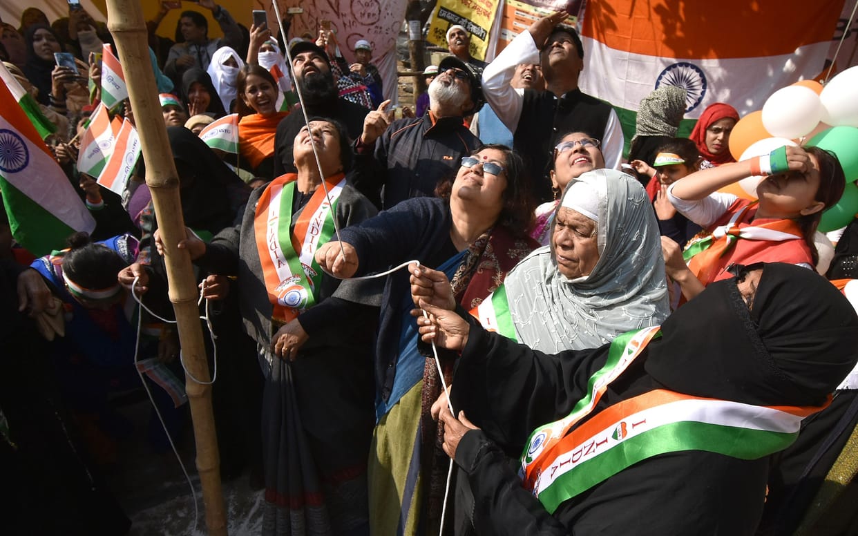 demostrator host the national flag