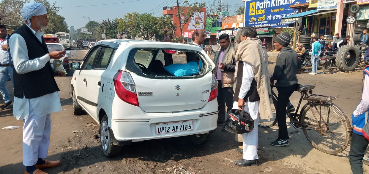 Car damaged in truck collision, five people narrowly escaped