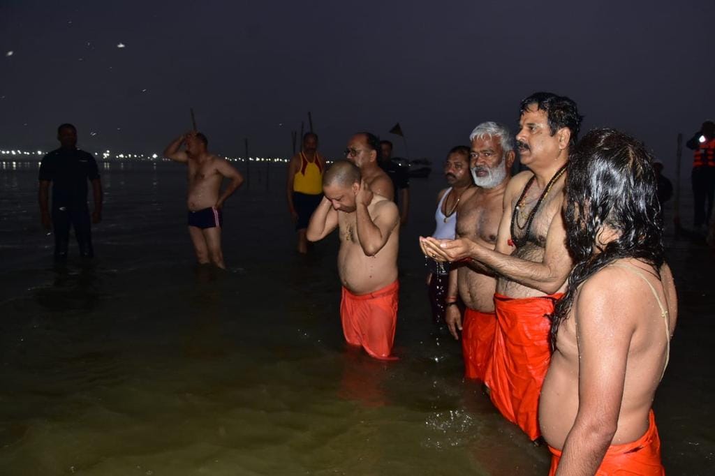See photos: CM Yogi dives in Ganges with ministers in Prayagraj