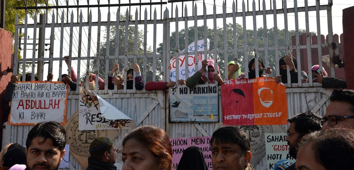 Slamming the student on the gate, a lock on the gate, commotion and sloganeering
