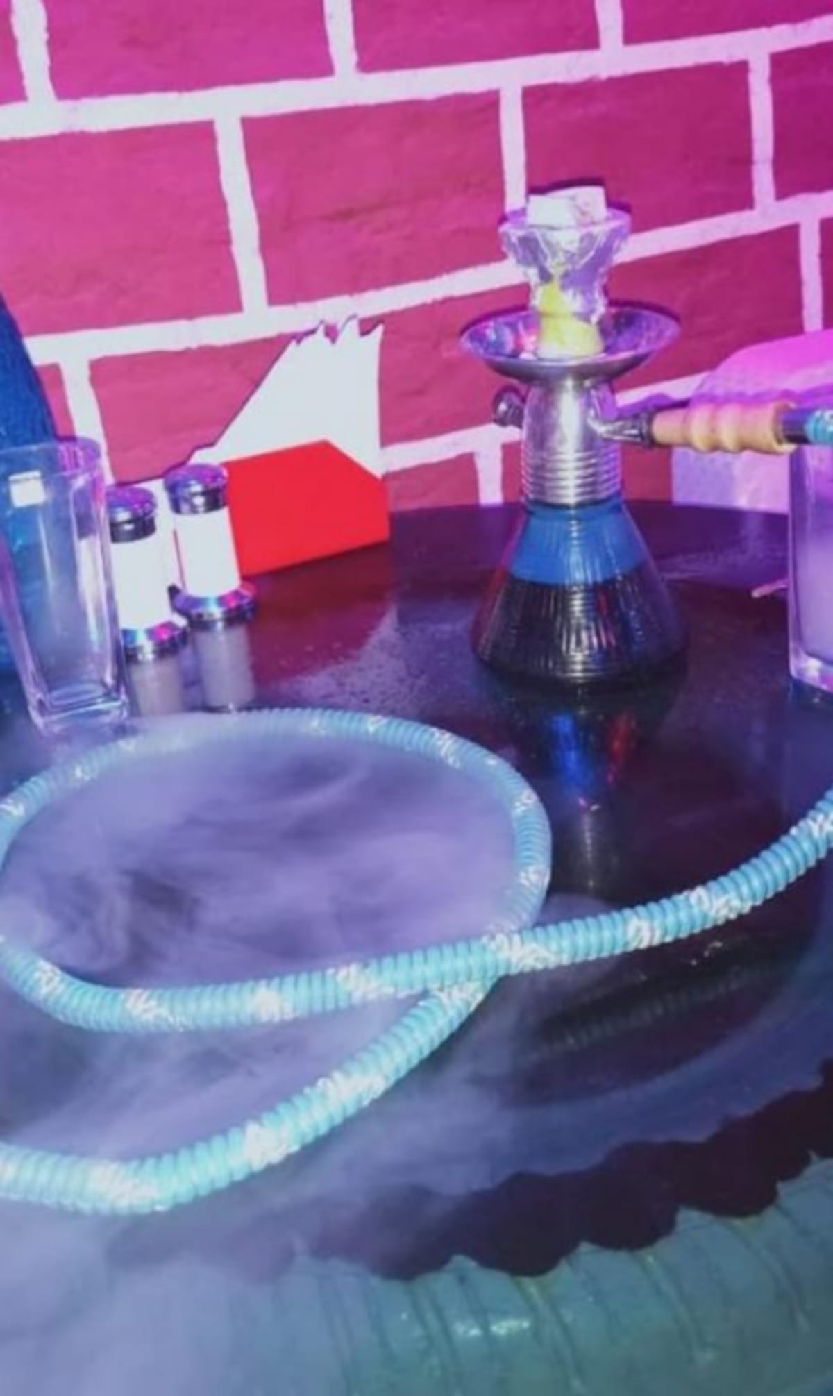 Teenager go out taking smoking Hookah Bar in varanasi