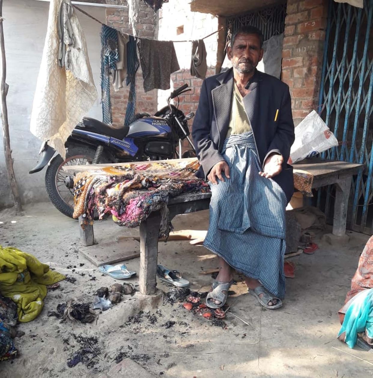 Efforts to kill the villager sleeping outside the house by burning them alive, by putting kerosene on fire