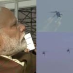 एयर शो का आनंद लेते प्रधानमंत्री नरेंद्र मोदी।