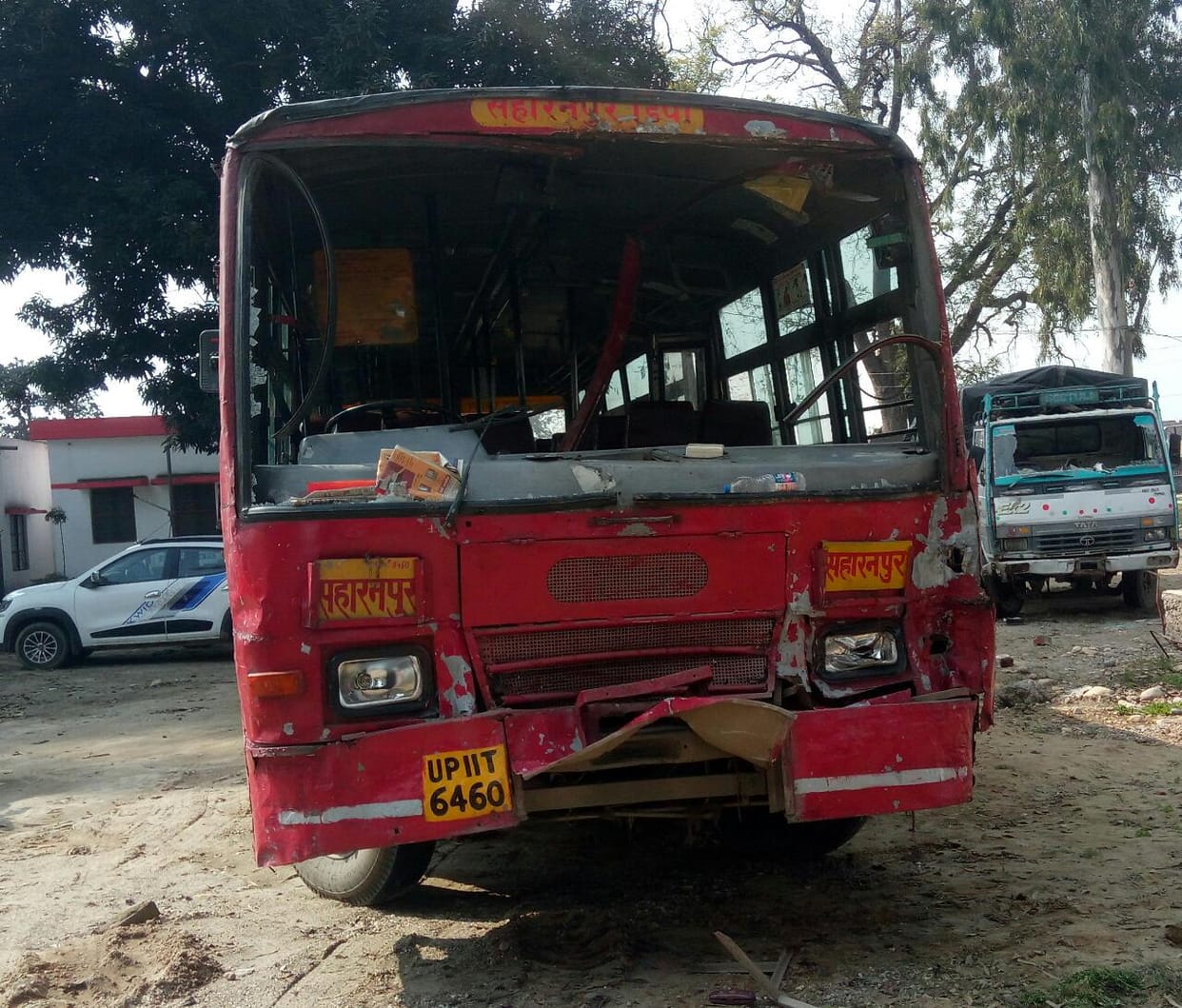 Tractor trolley overturned due to collision with roadways bus, worker dead