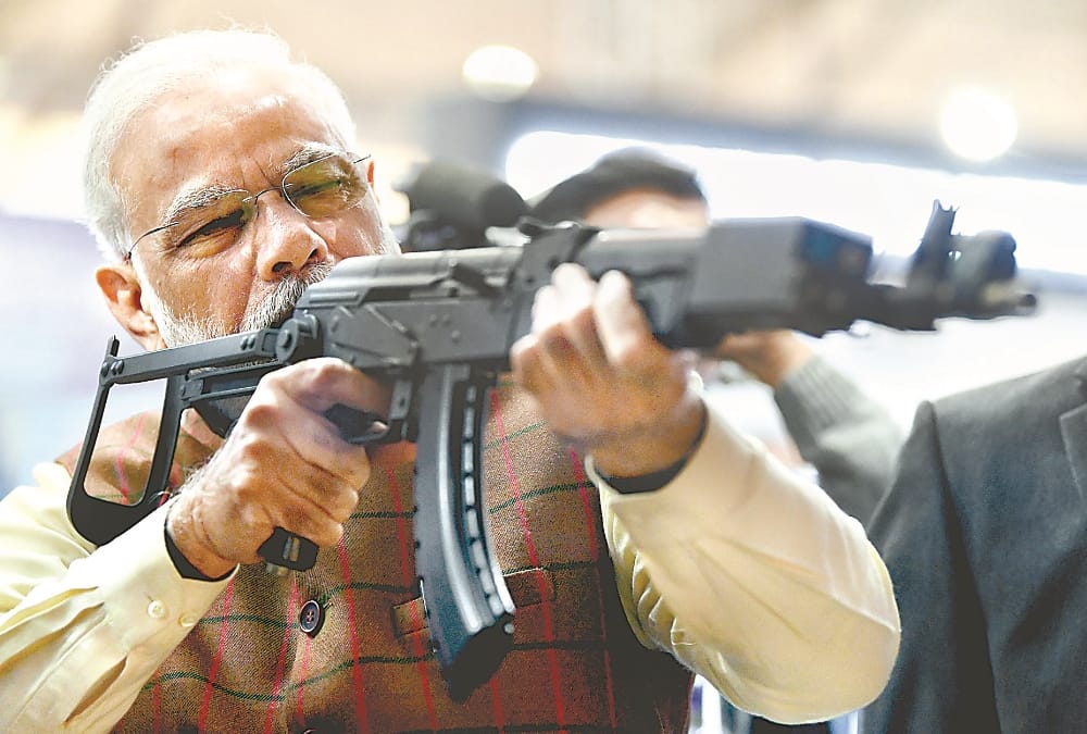 Prime minister narendra modi enjoys shooting in defence expo.