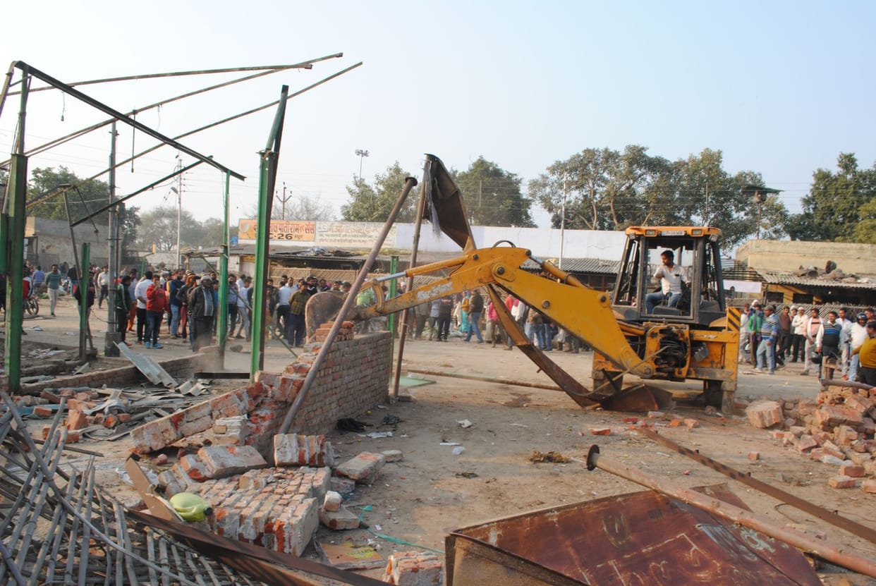 thrown stones during demolition of incroachment