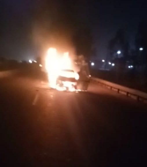 Fire in the moving car on the highway