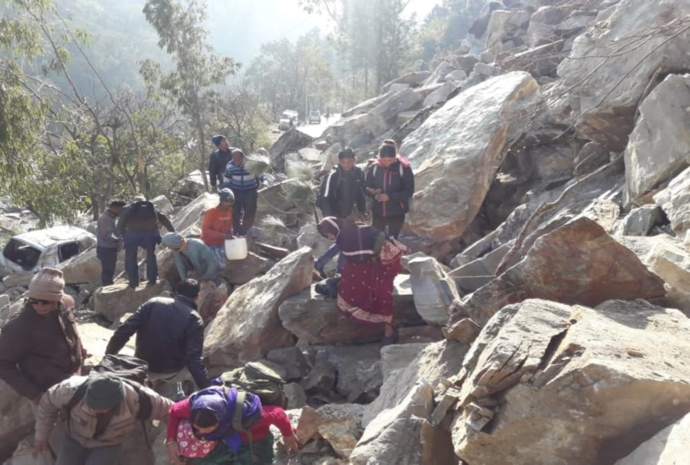 Mountain Collapse on badrinath highway, Public cross road with very Difficulty photos