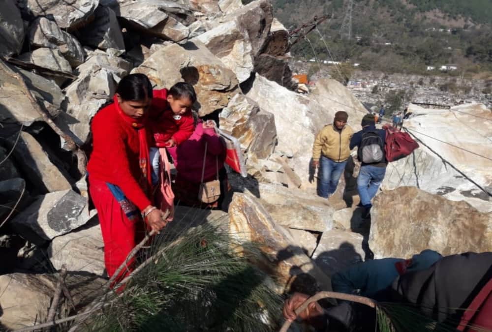 Mountain Collapse on badrinath highway, Public cross road with very Difficulty photos