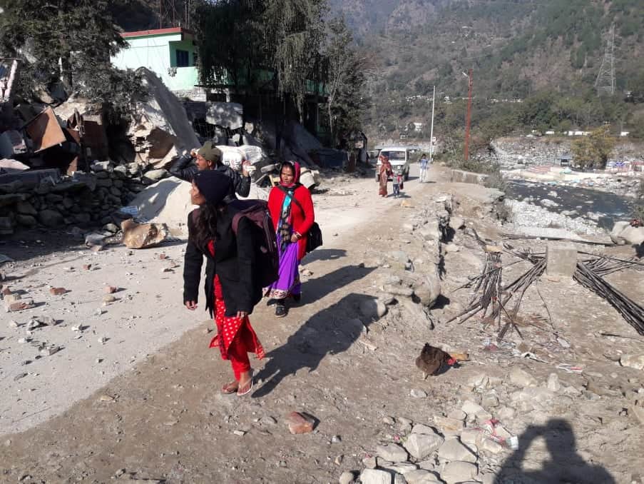Mountain Collapse on badrinath highway, Public cross road with very Difficulty photos