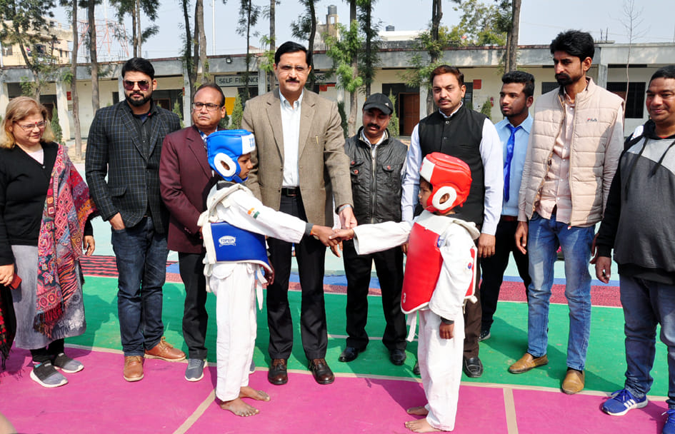 Taekwondo and badminton competition held