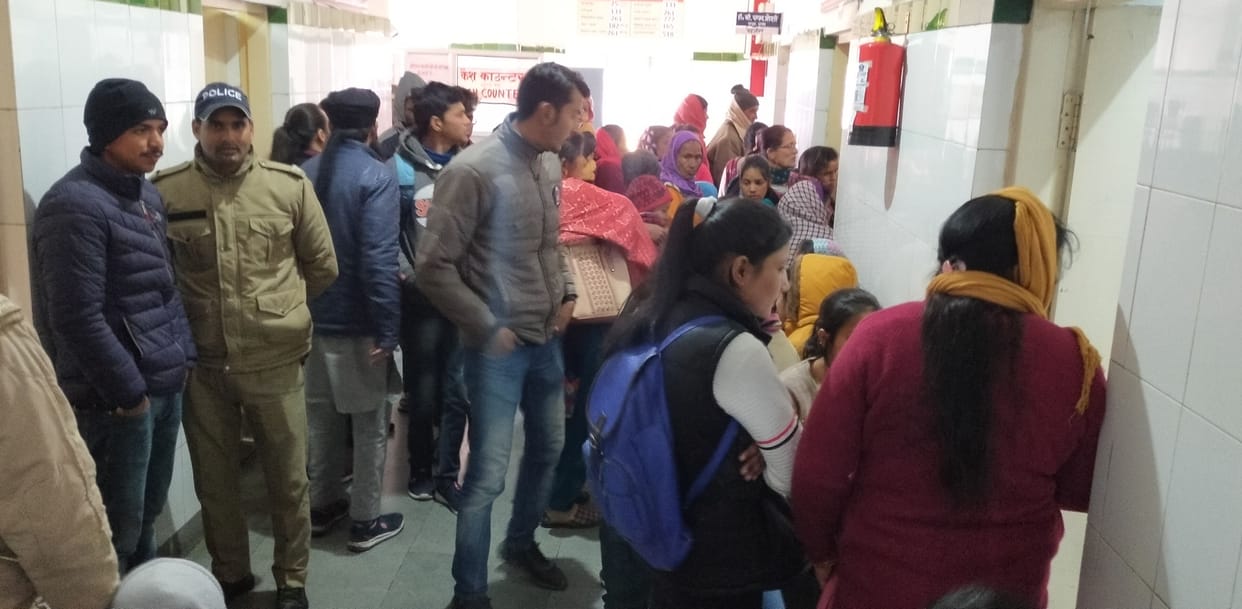 Crowd of patients gathered in district hospital