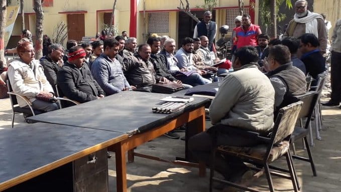 Women sat, officers came and went.