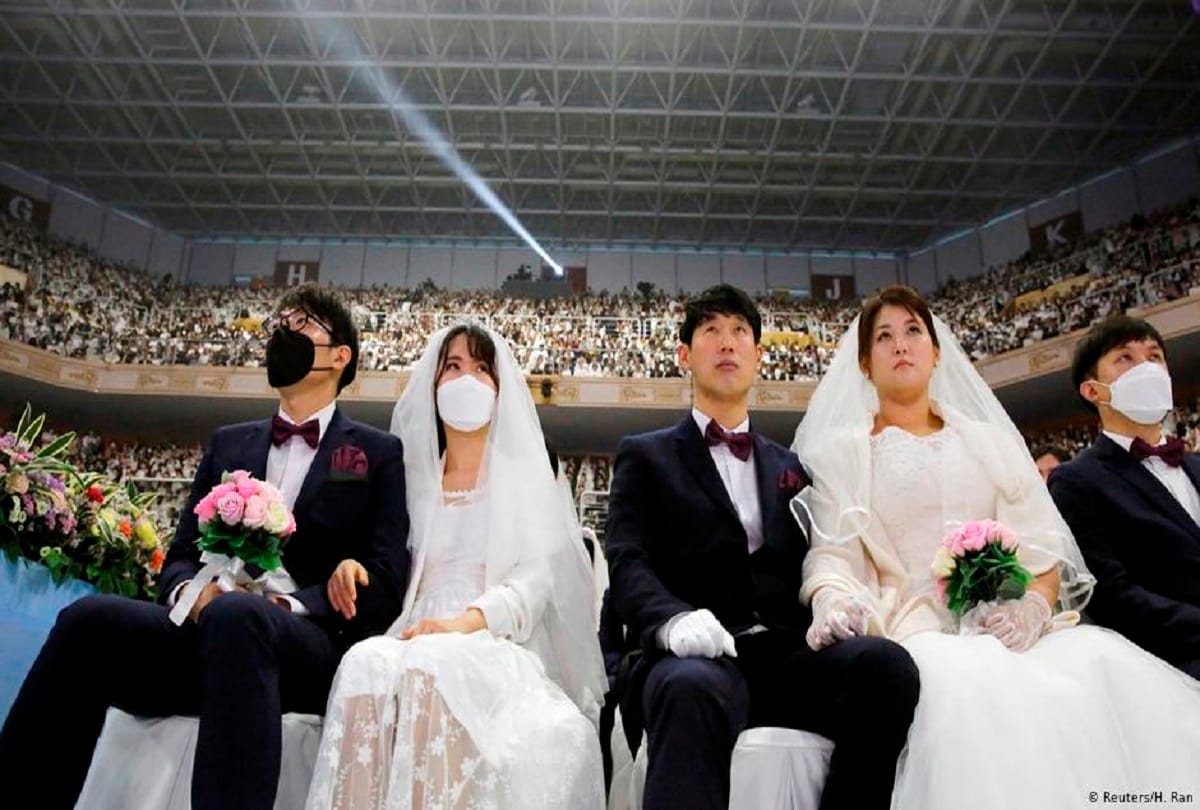 South Korea mass wedding defies coronavirus fears, some wears mask