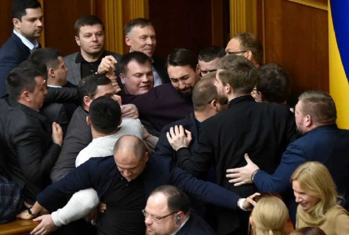 A fierce scuffle between the government and profarmer MPs in Ukraine  parliament