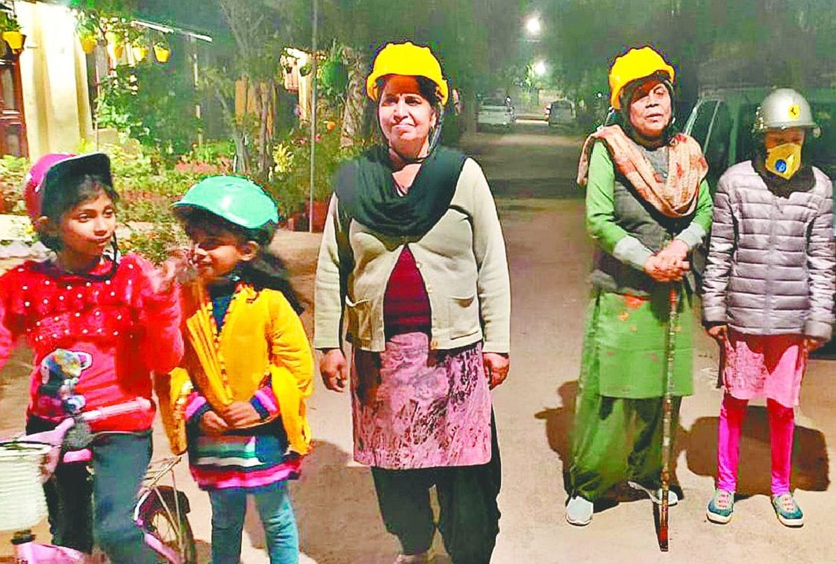 people wear helmet during walking in dayalbagh agra