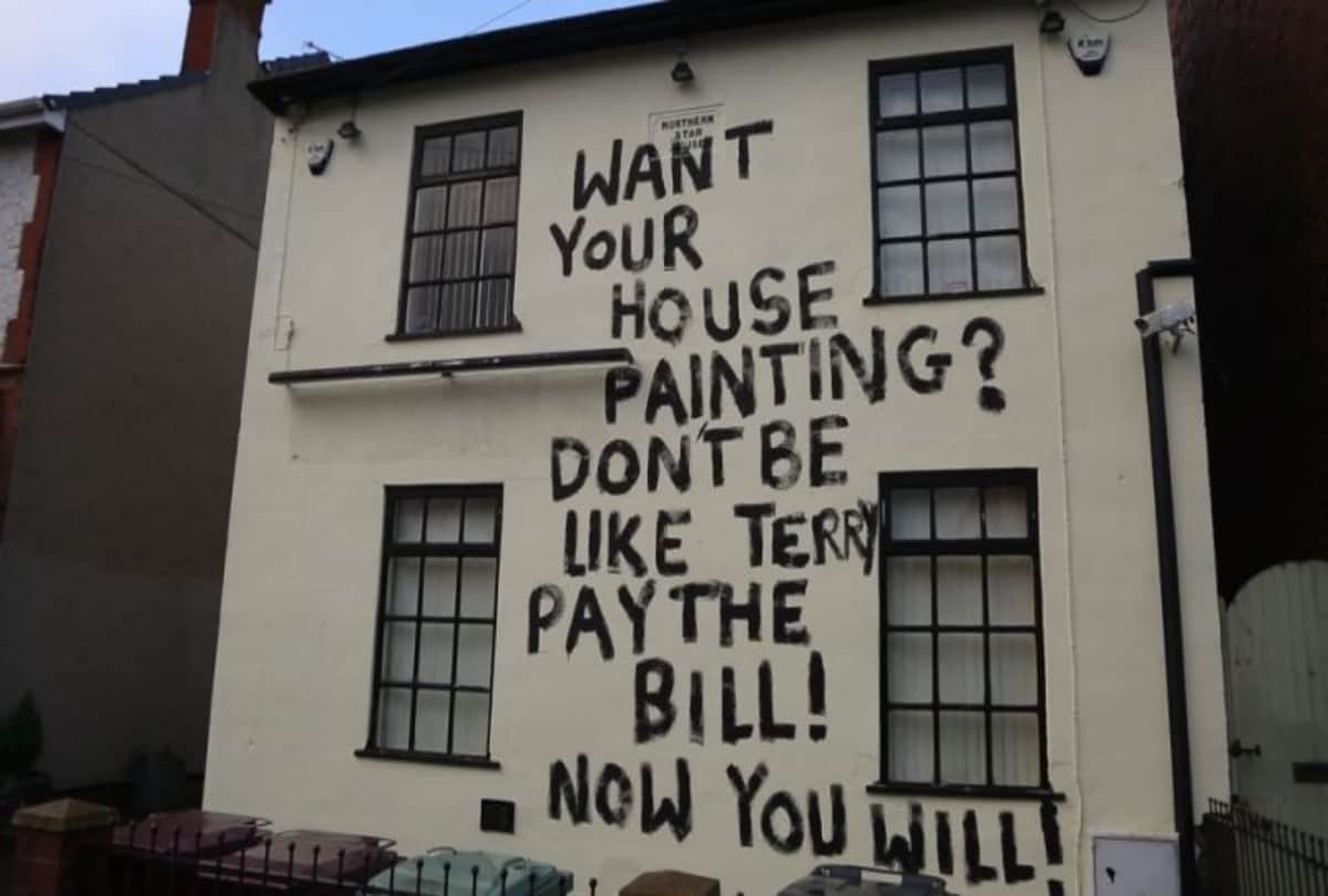 england viral painter writes angry message on building after not getting wages
