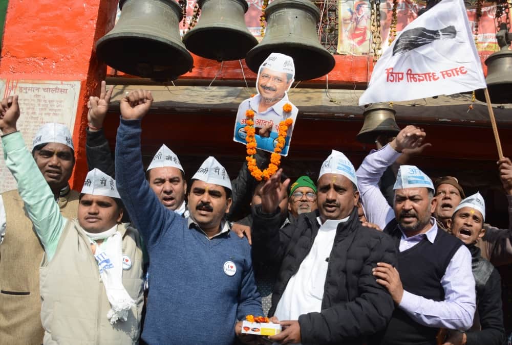 Aam Admi Party workers celebrate victory in Uttar Pradesh.