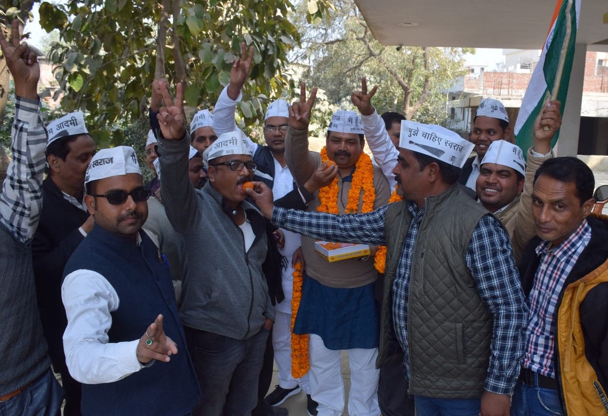 Aam Aadmi Pati activists after winning the Delhi Legislative Assembly election