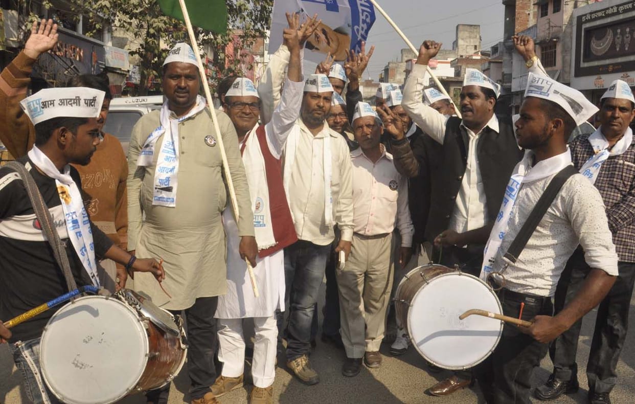 Activists celebrate on AAP's victory