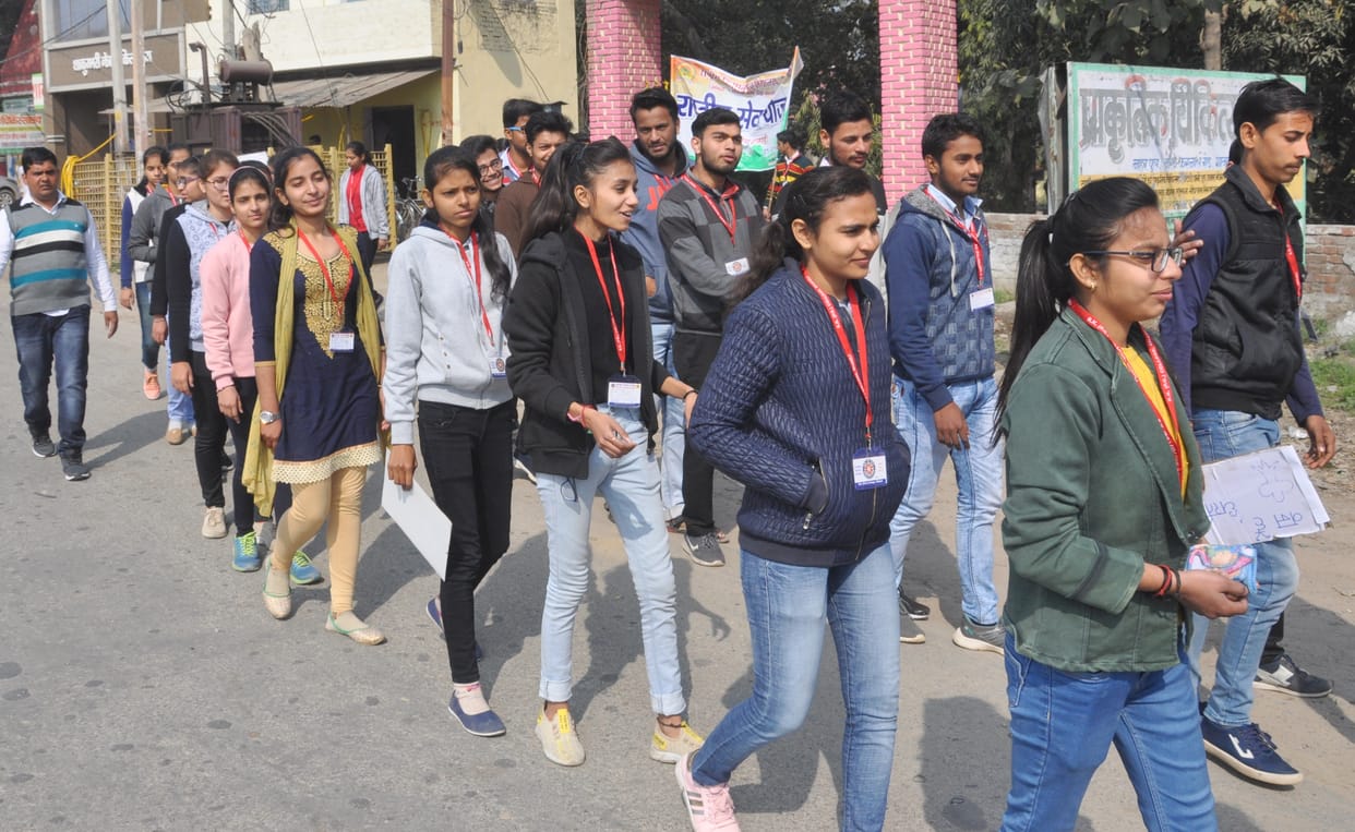 Volunteers organize a voter awareness rally